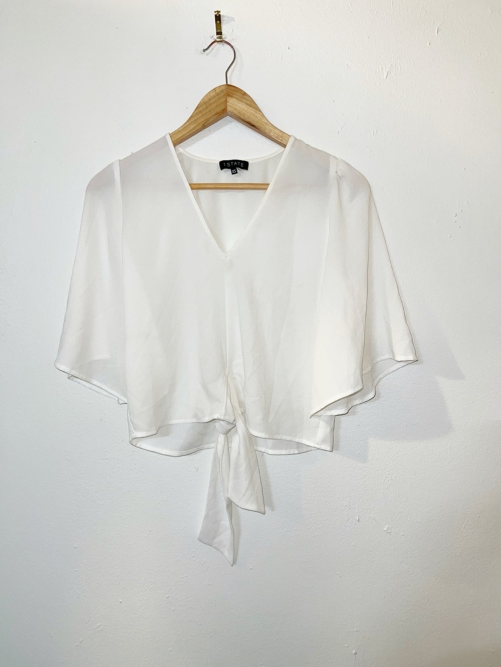 1. State semi sheer flowy white v neck knot front short sleeve blouse
